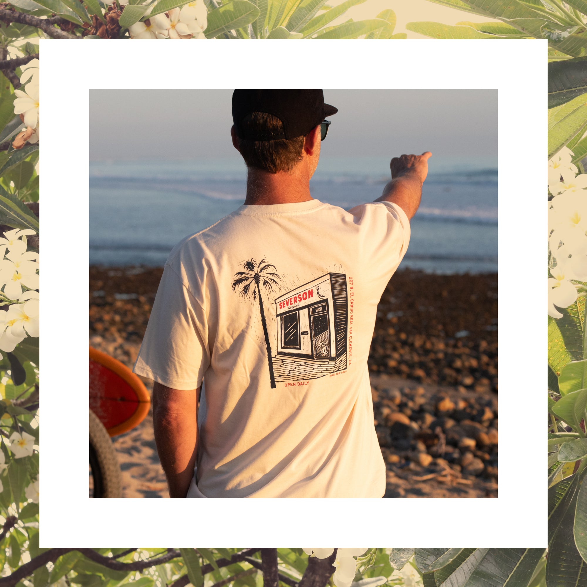 Photo of man looking at the waves down at Trestles, wearing the Severson 207 shop tee. 