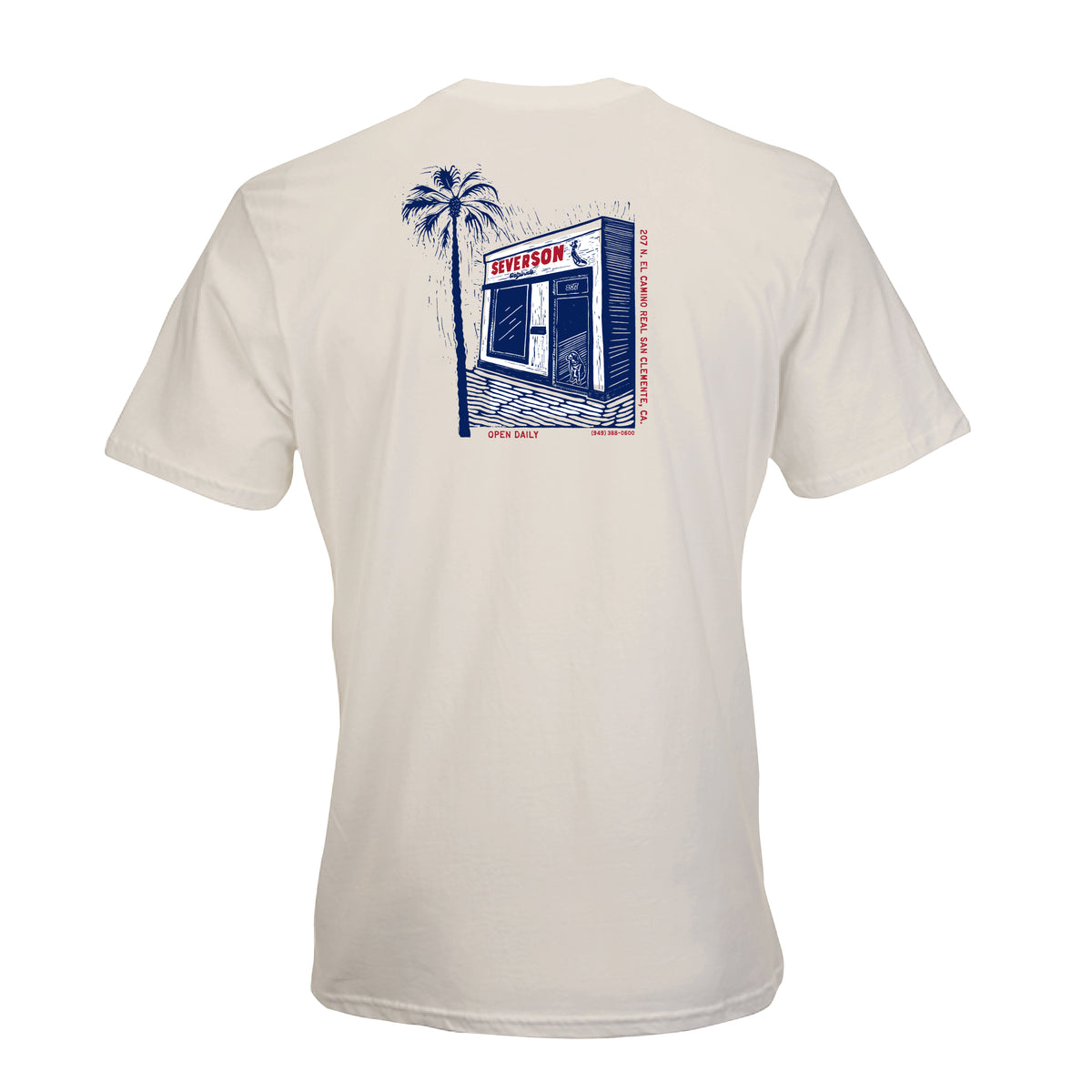 Back of mens t-shirt in Vintage white. Back design in red, white and blue image of Severson store in San Clemente, with palm tree and dog in doorway. also shows shop address in smaller text